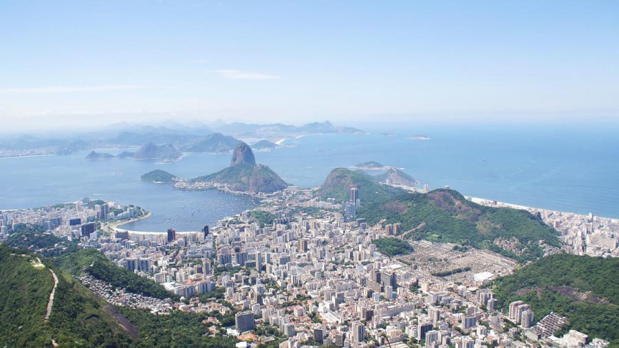 Aerial view of a Brazilian city and surrounding mountains and islands