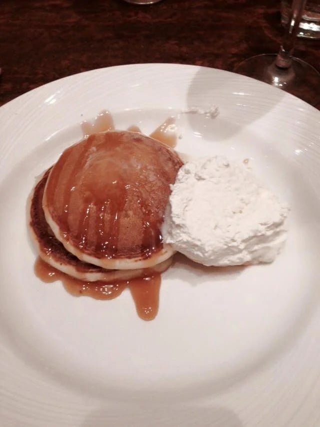 Pancakes and ice cream  on a plate with sauce