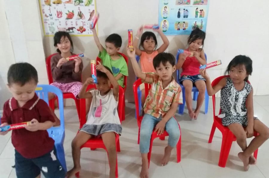 Children sitting down in a classroom