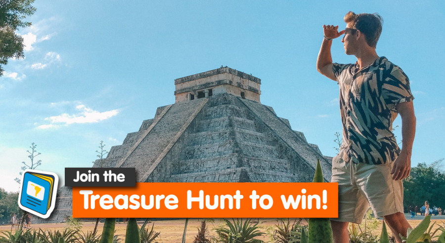 Man looking over Chichen Itza. Join the Treasure hunt to win