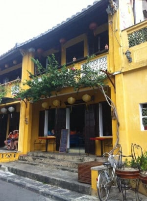 A building in Ho Chi Minh City with a bright yellow exterior