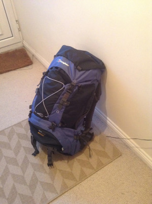 A backpack near a door