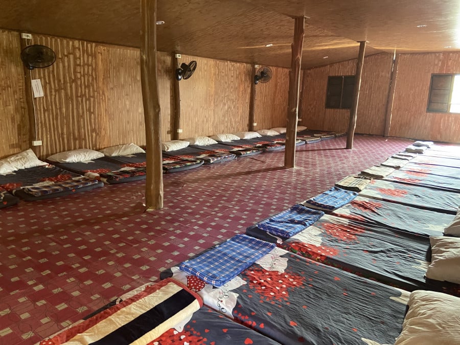 Futon-style beds in a wooden building