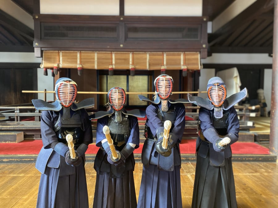 Traveller learning in a traditional Kendo Class in Japan
