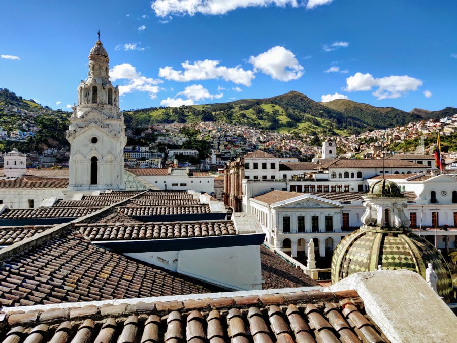 Landscape of colonial architecture with mountains in the background in Quito, Ecuador
