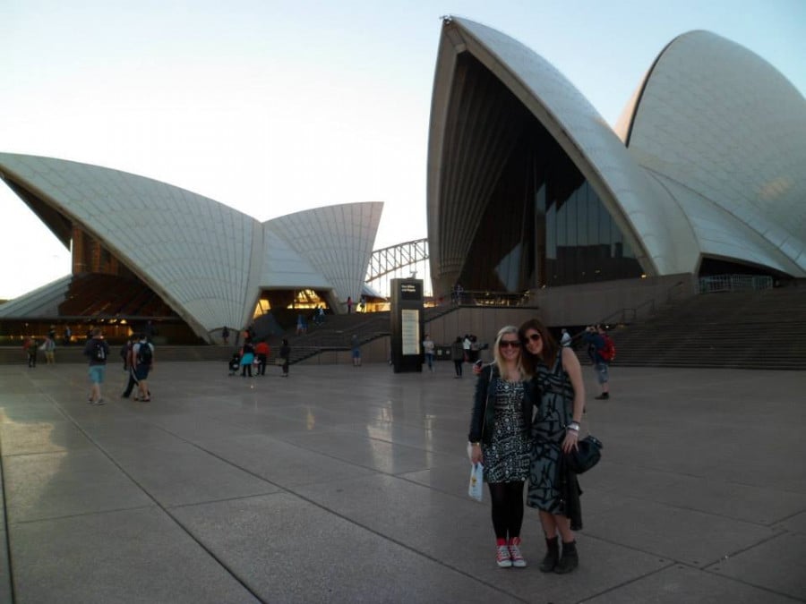 Sama and a fellow traveller standing in front of the Sydney Opera House