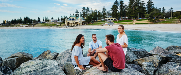 Group sitting by Cottesloe beach