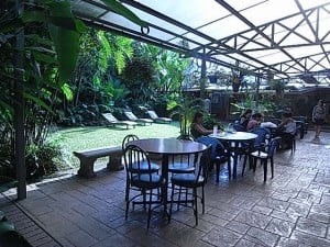 A dining area amongst lush greenery