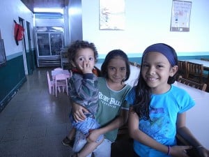 Three small children at an orphanage