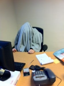 Gap 360 staff member with a blanket over their head